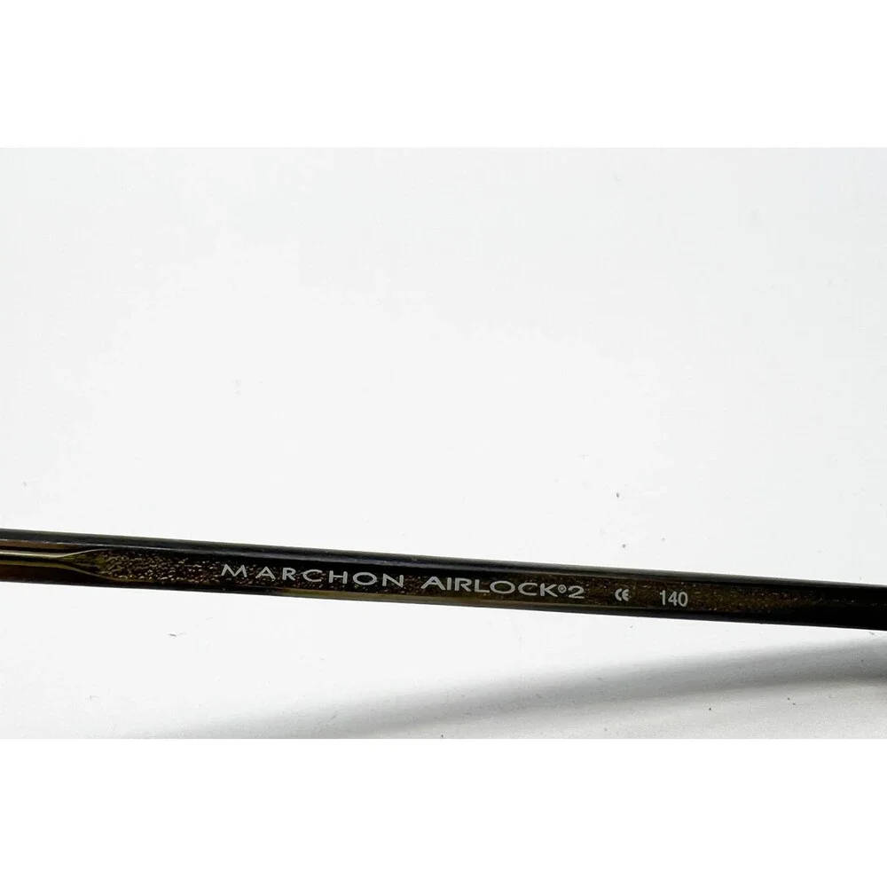 Marchon Airlock 2 Eyeglasses Mens Brown Rimless Rectangle 51-21-140